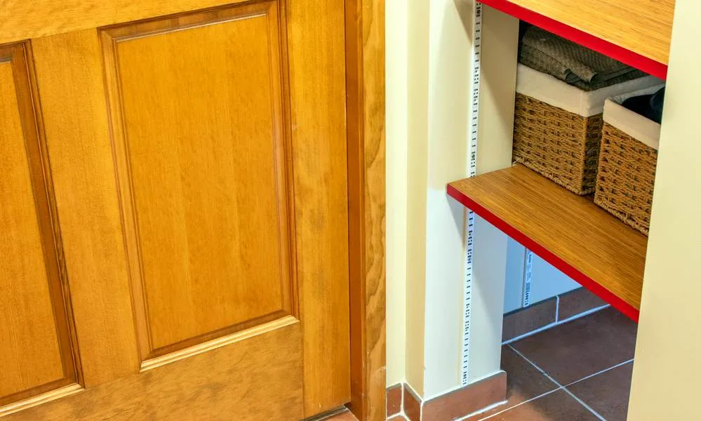Built-in shelving and storage details in the Greenwood bathroom and laundry renovation