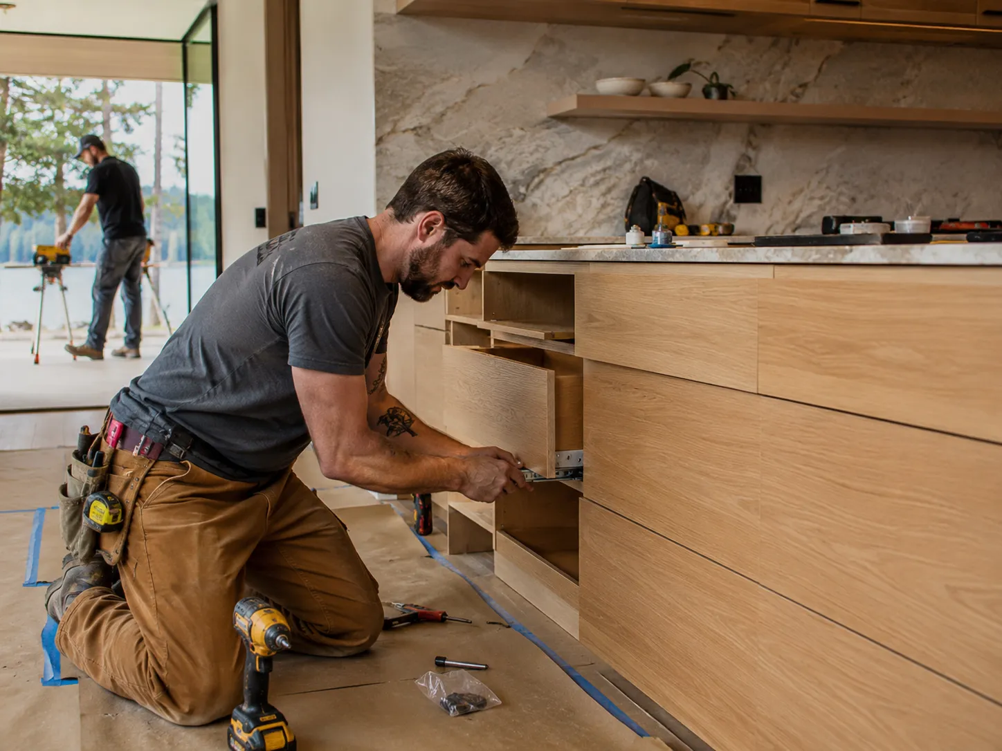 Construction team completing a kitchen remodel