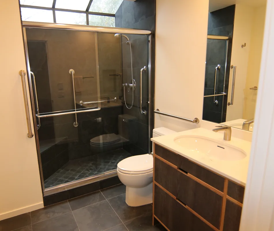 Guest bathroom with glass shower and vanity in the Haller Lake remodel