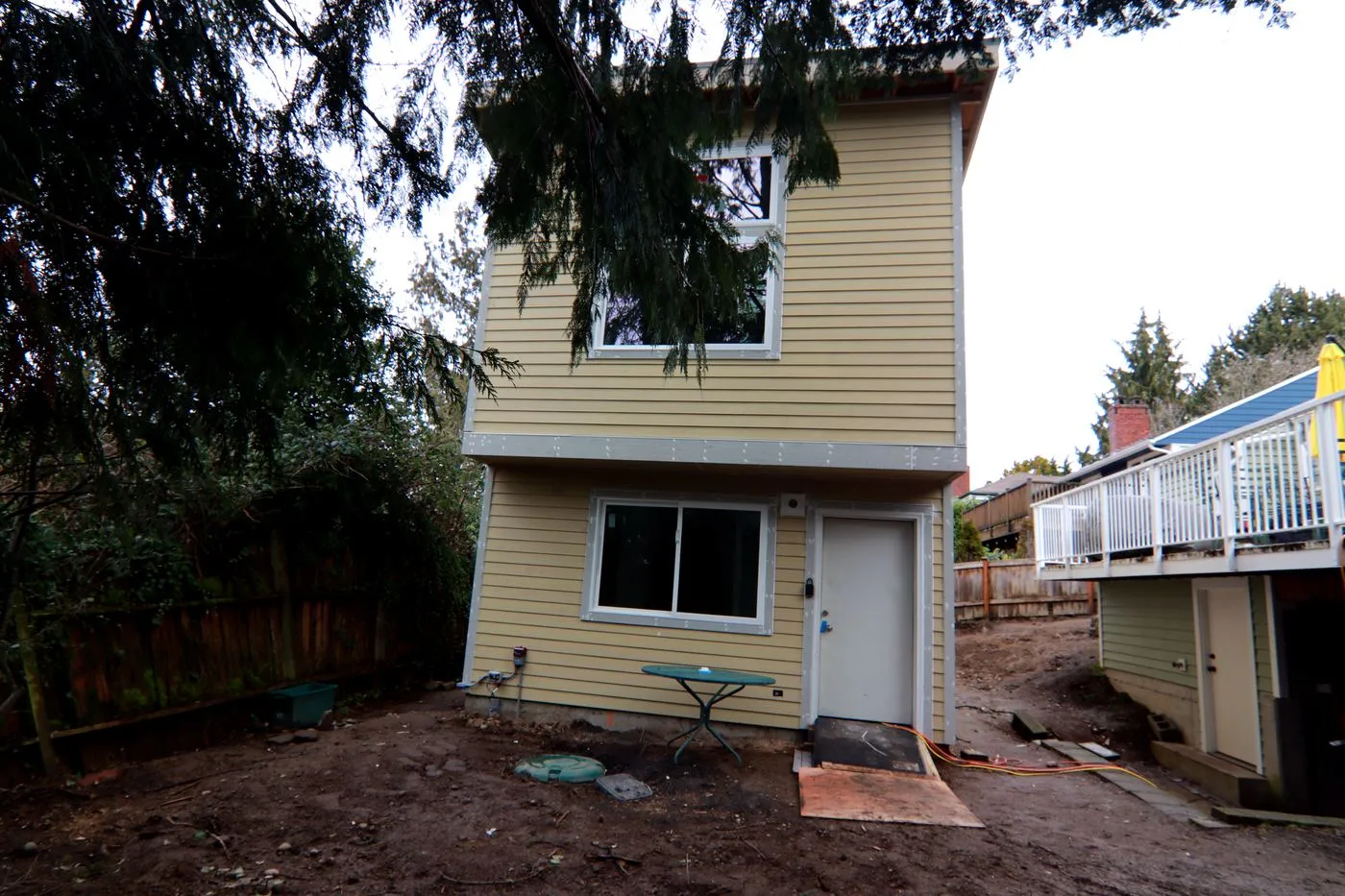 Progress view of the deck and shed below the DADU