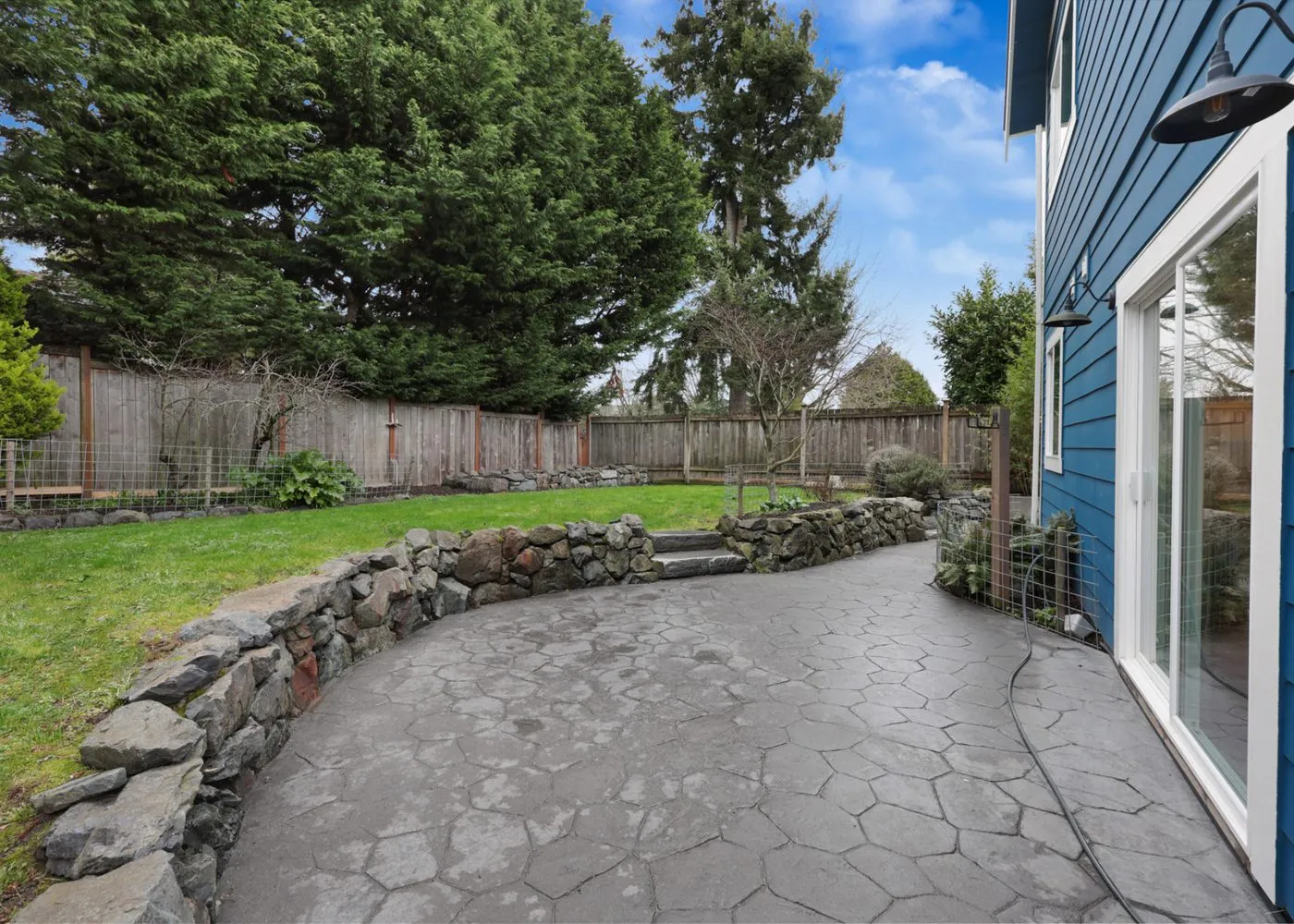 Stamped patio and stonework in the backyard